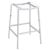 Close-up of clear acrylic seat and chrome metal footrest of Jovani bar stool