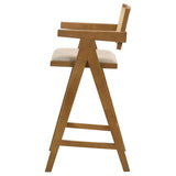 Back view showing woven rattan design on Kane bar stool