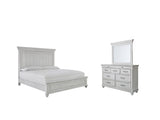 Side view of Kanwyn Whitewash Panel Bedroom Set bed