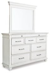 Bedroom scene with Kanwyn Whitewash Panel Bedroom Set bed