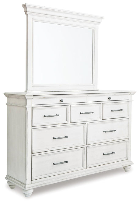 Bedroom scene with Kanwyn Whitewash Panel Bedroom Set bed