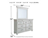 Side angle of Kanwyn Whitewash Panel Bedroom Set bed
