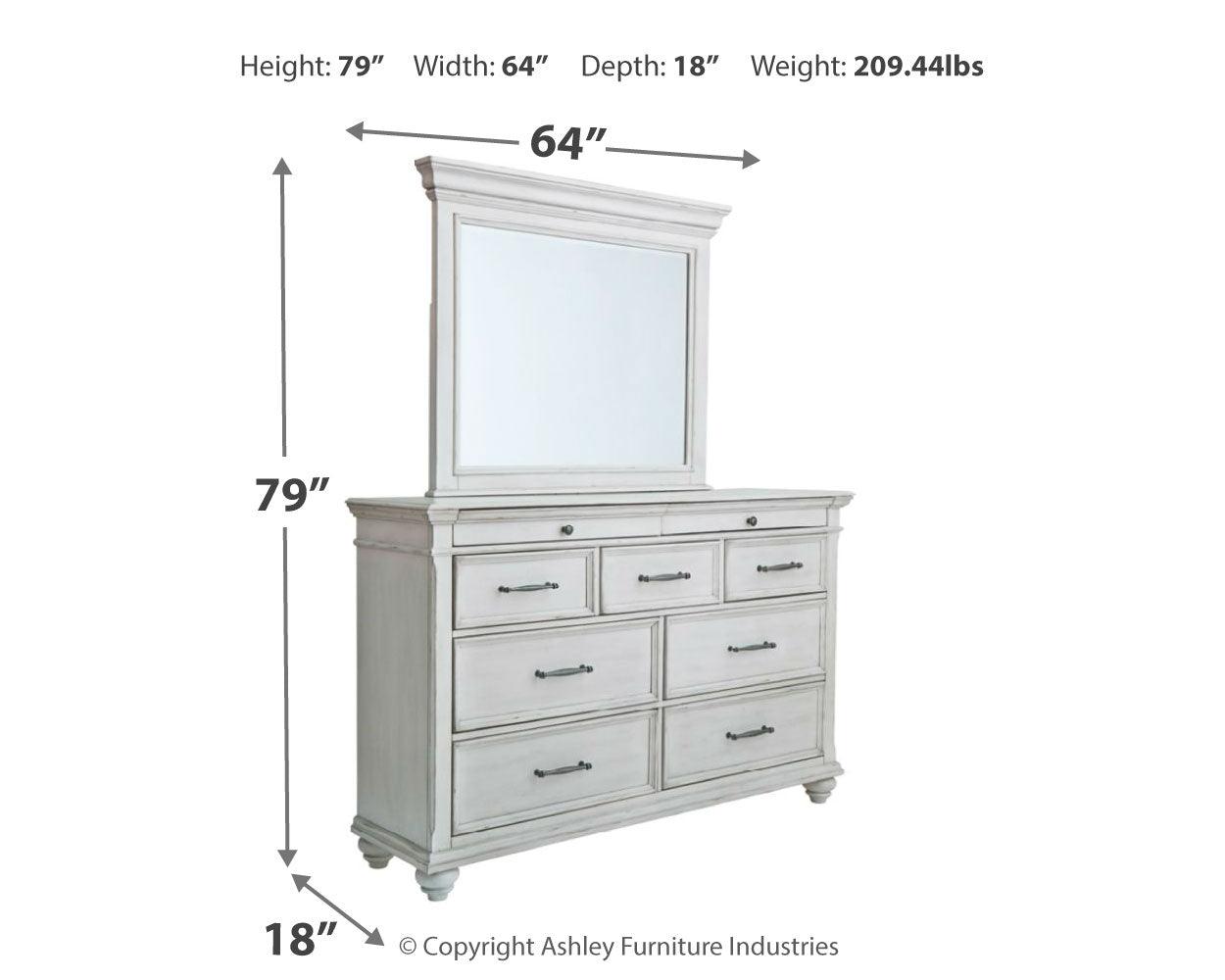 Side angle of Kanwyn Whitewash Panel Bedroom Set bed