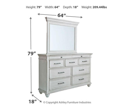 Side angle of Kanwyn Whitewash Panel Bedroom Set bed