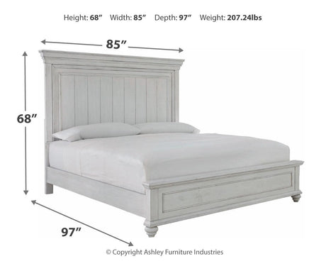 Bedroom layout featuring Kanwyn Whitewash Panel Bedroom Set