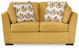 Close-up of loveseat chenille fabric texture in sunflower yellow