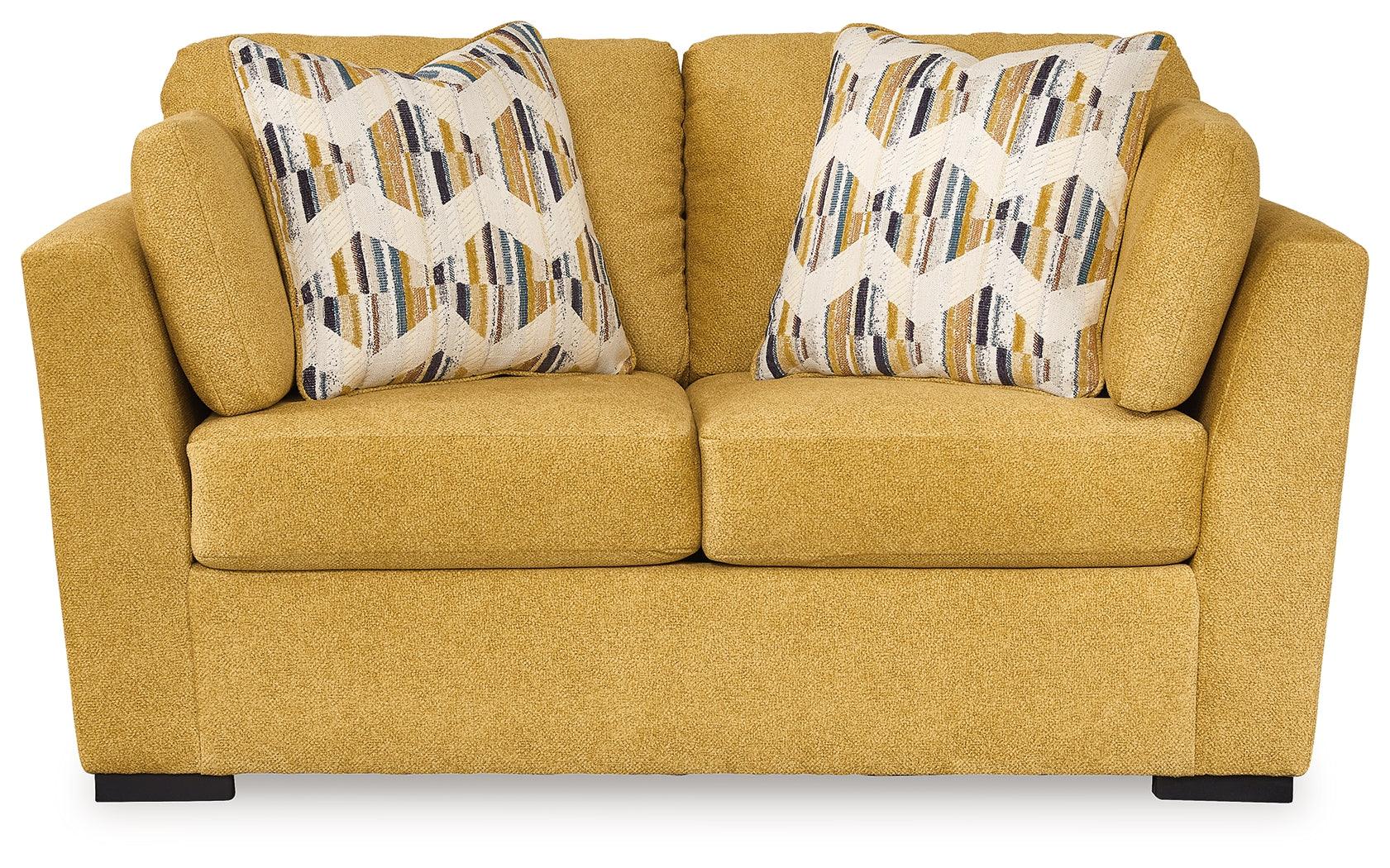 Close-up of loveseat chenille fabric texture in sunflower yellow
