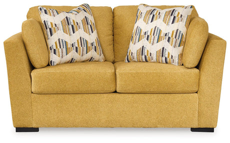Close-up of loveseat chenille fabric texture in sunflower yellow