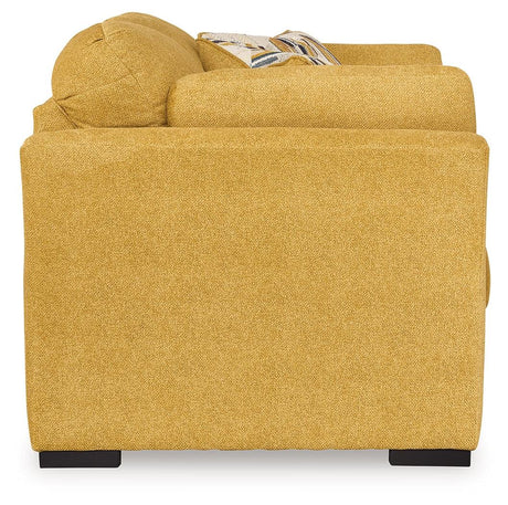 Detailed view of accent and bolster pillows on Keerwick loveseat
