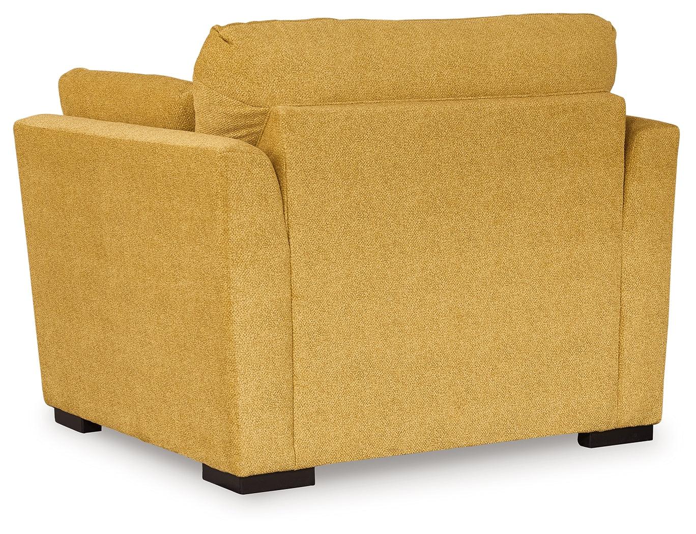 Keerwick chair showing exposed faux wood finish feet