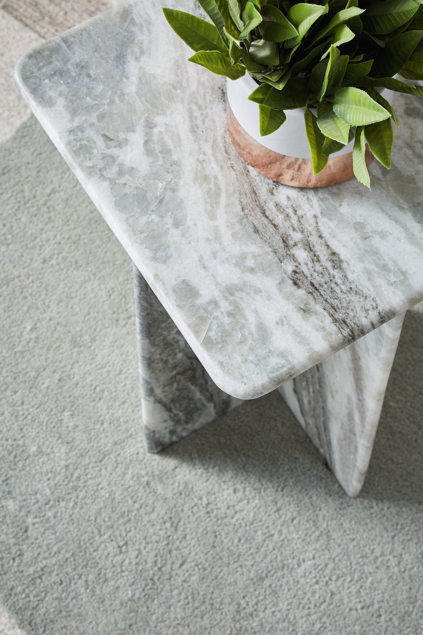Top view showing smooth marble surface of accent table