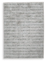 Close-up of Laddway cream and green striped medium area rug texture