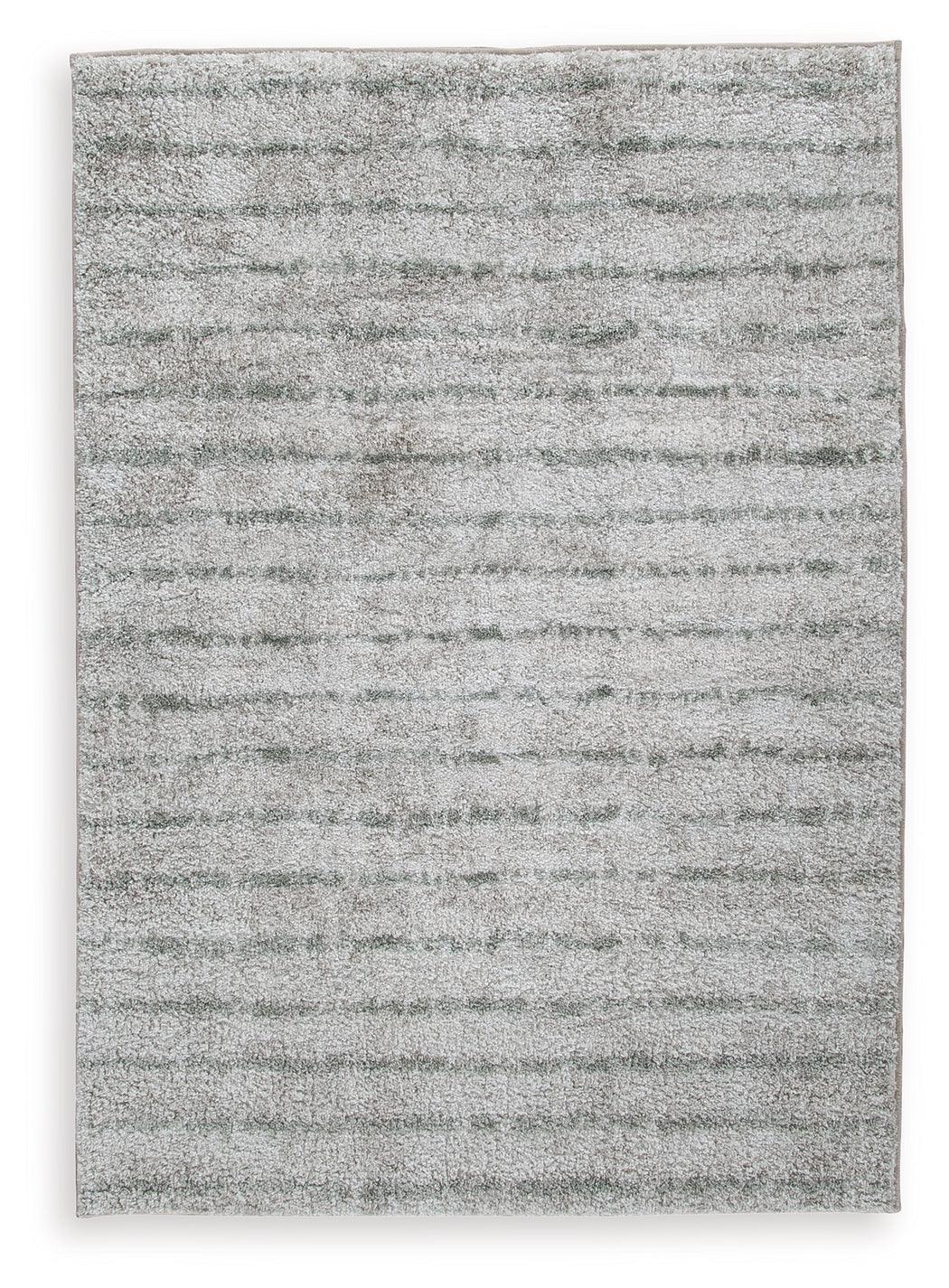 Close-up of Laddway cream and green striped medium area rug texture