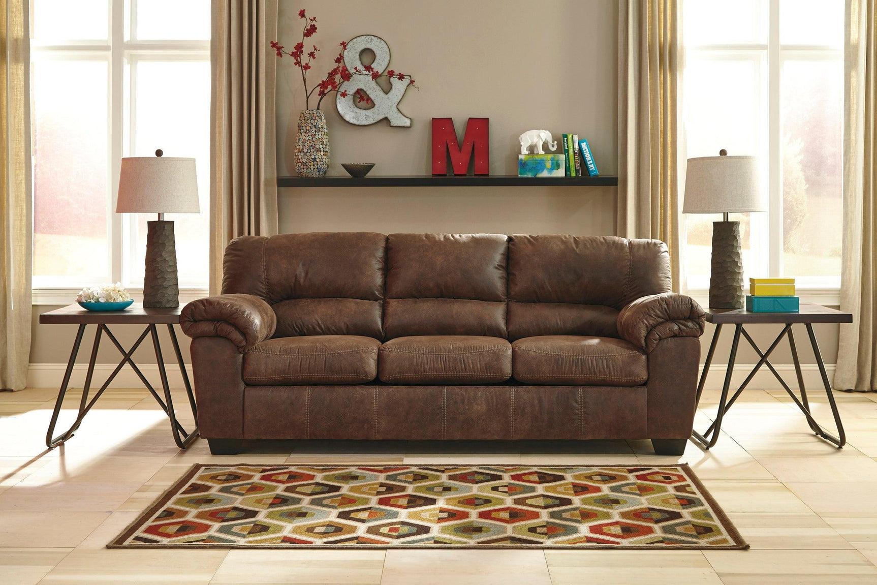 Side angle of coffee faux leather full size sleeper sofa with solid wood frame