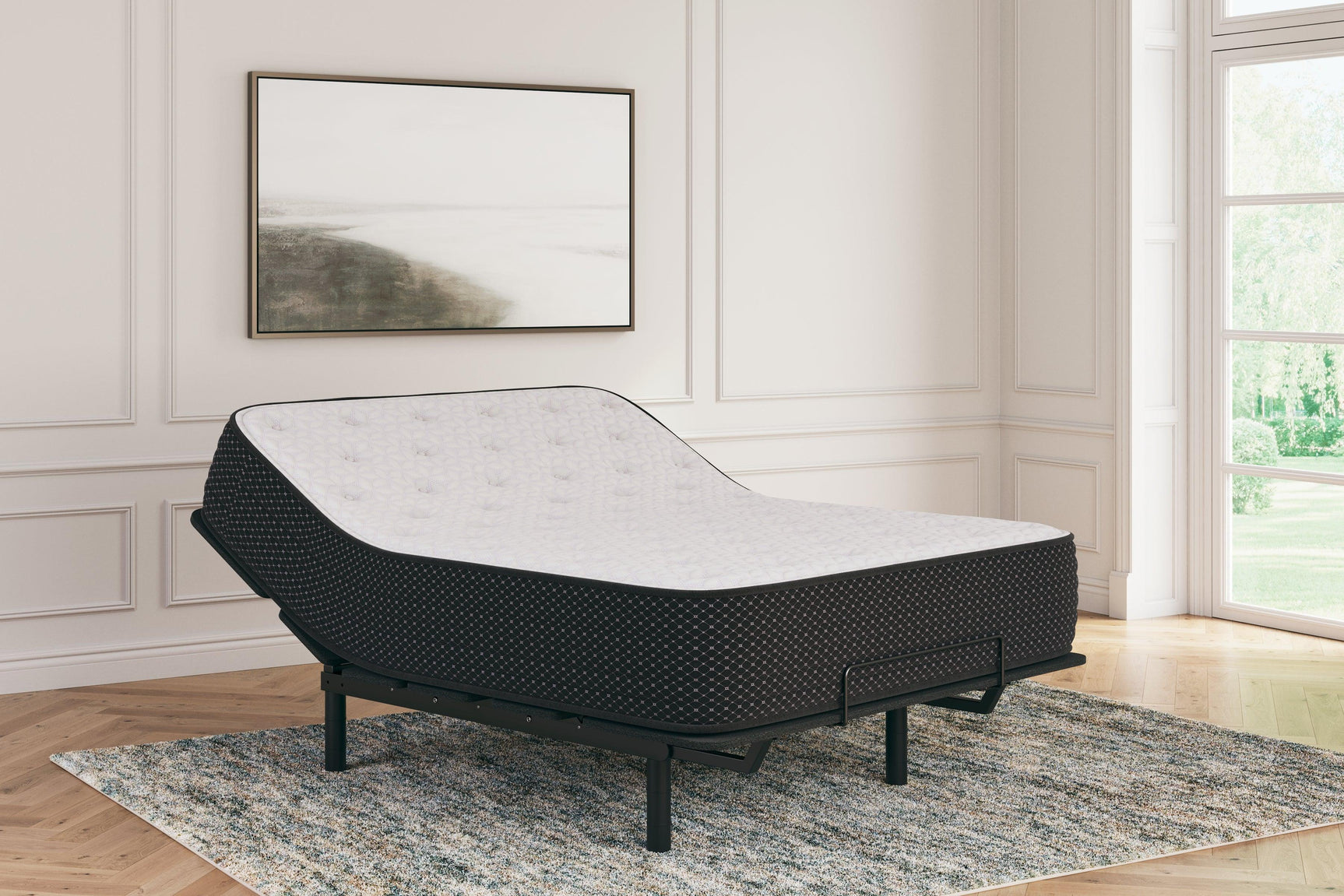 Limited Edition Plush White King Mattress fully expanded on bed frame