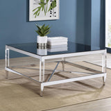 Close-up of chrome metal frame and acrylic legs of Lindley coffee table
