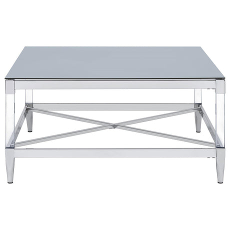 Modern Lindley coffee table with floating acrylic legs and reflective mirror top
