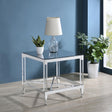 Side angle of Lindley Square End Table highlighting chrome metal frame and clear acrylic legs