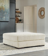 Lindyn Ivory 2-Piece Sectional with Ottoman - image 7