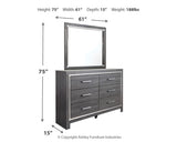 Bedroom view showcasing Lodanna Gray Panel Storage Bedroom Set