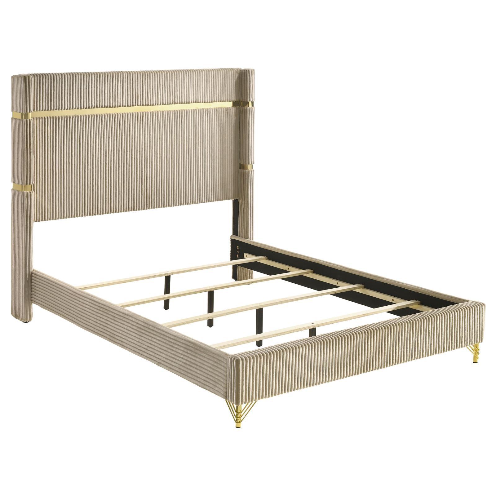 Close-up of wingback headboard with gold accents