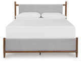 Close-up of Lyncott bed upholstered cushioned headboard
