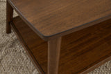 Lyncott Medium Brown Wood Table Set multiple angles in showroom