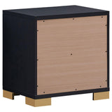 Detailed view of gold vertical metal hardware on Marceline nightstand
