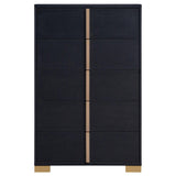 Close-up of gold metal drawer handle on Marceline chest