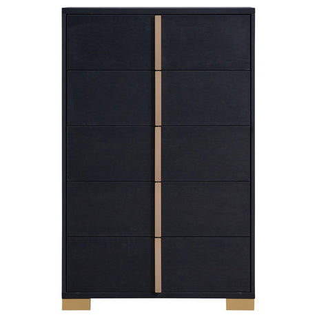 Close-up of gold metal drawer handle on Marceline chest