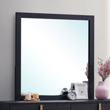 Close-up of Marceline mirror black frame and glass