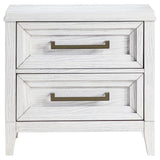 Close-up of golden bronze bar pull hardware on drawer