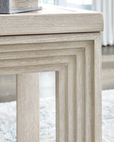 Marxhart End Table with decor items on shelf