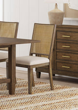 Side view of Matisse brown dining chair showing tapered legs and rattan back