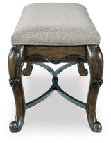 Decorative ornamental appliques on bench legs