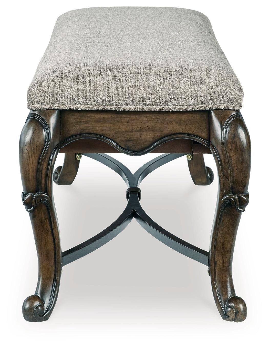 Decorative ornamental appliques on bench legs