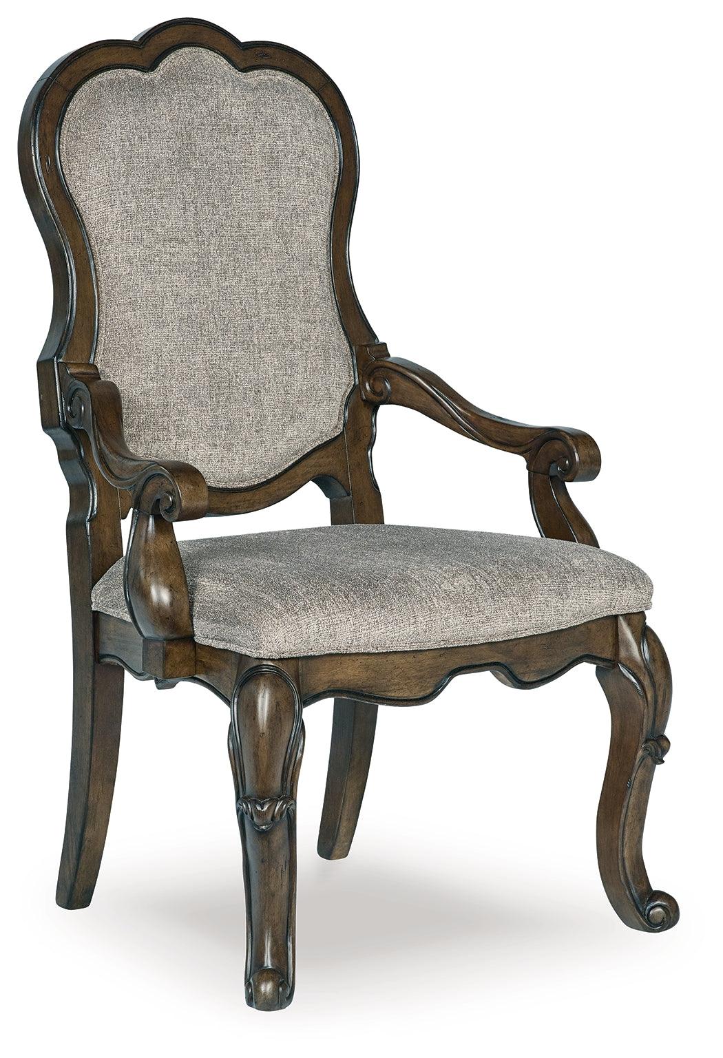 Ornate arms of Maylee dark brown dining chair