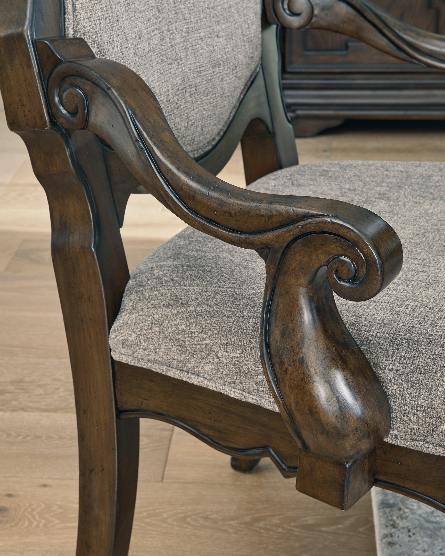 Maylee chair angled view highlighting ornamental appliques
