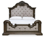 Dark brown king panel bed showcasing tufting