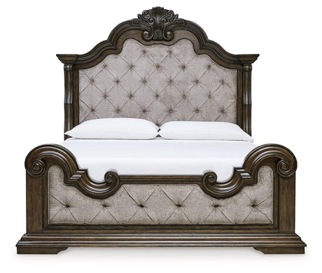 Dark brown king panel bed showcasing tufting