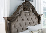 Side perspective of Maylee dark brown king bed