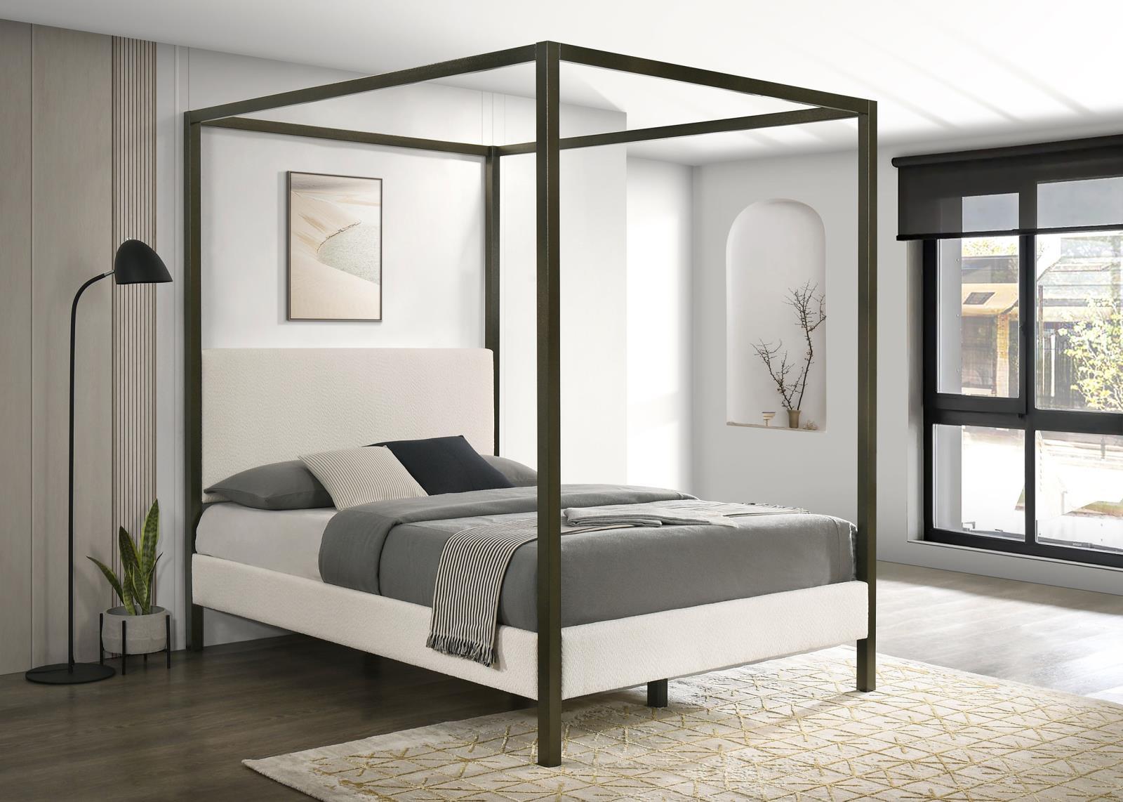 Front angle of Monroe Eastern King Upholstered Canopy Platform Bed in vanilla fabric and bronze frame