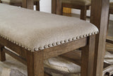 Barstools arranged around counter height table