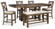 Moriville grayish brown counter height dining table viewed front