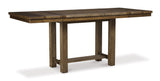 Moriville side view of grayish brown counter height dining table with upholstered bar stools