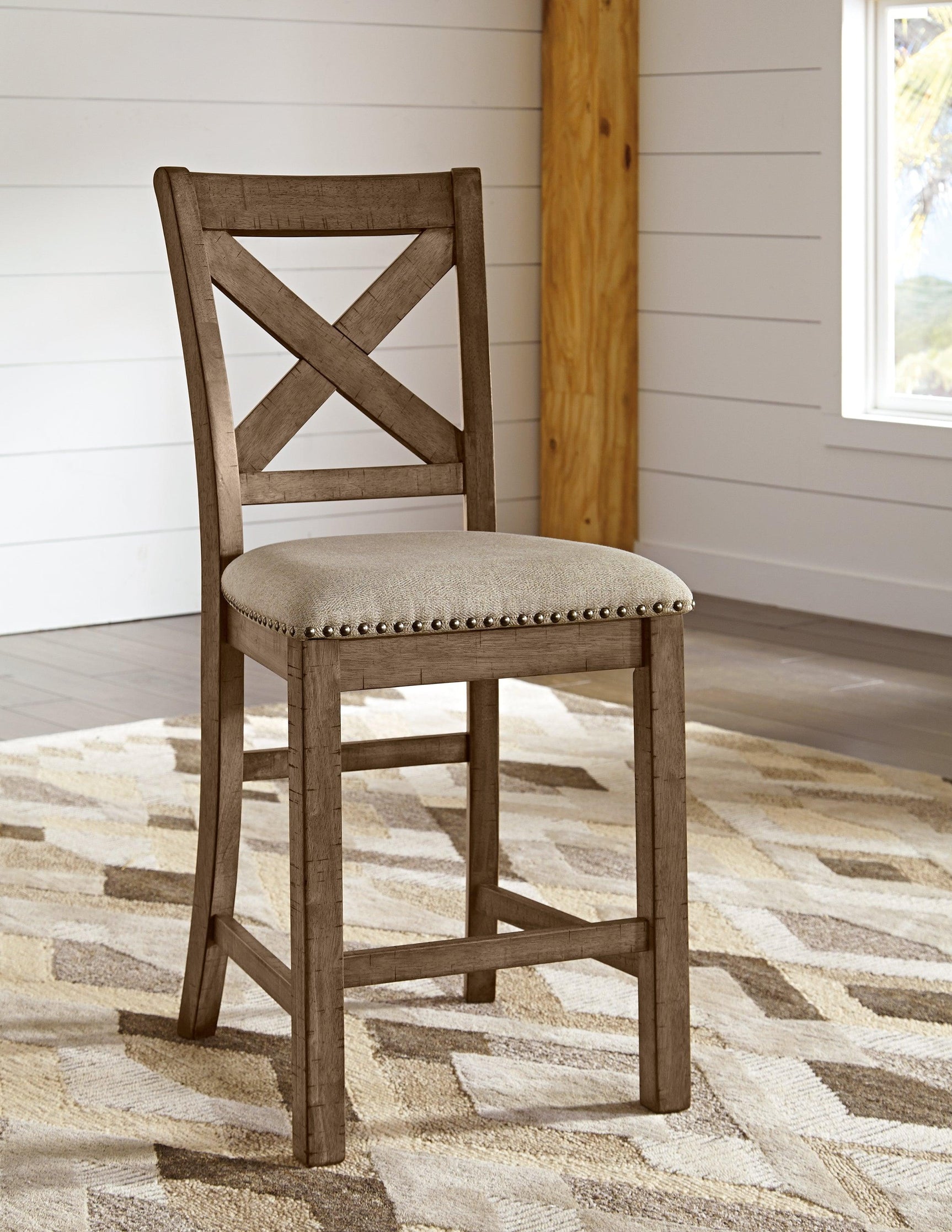 Moriville 4 upholstered bar stools with antiqued bronze nailhead trim detail