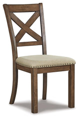 Four grayish brown upholstered barstools with nailhead trim around the table