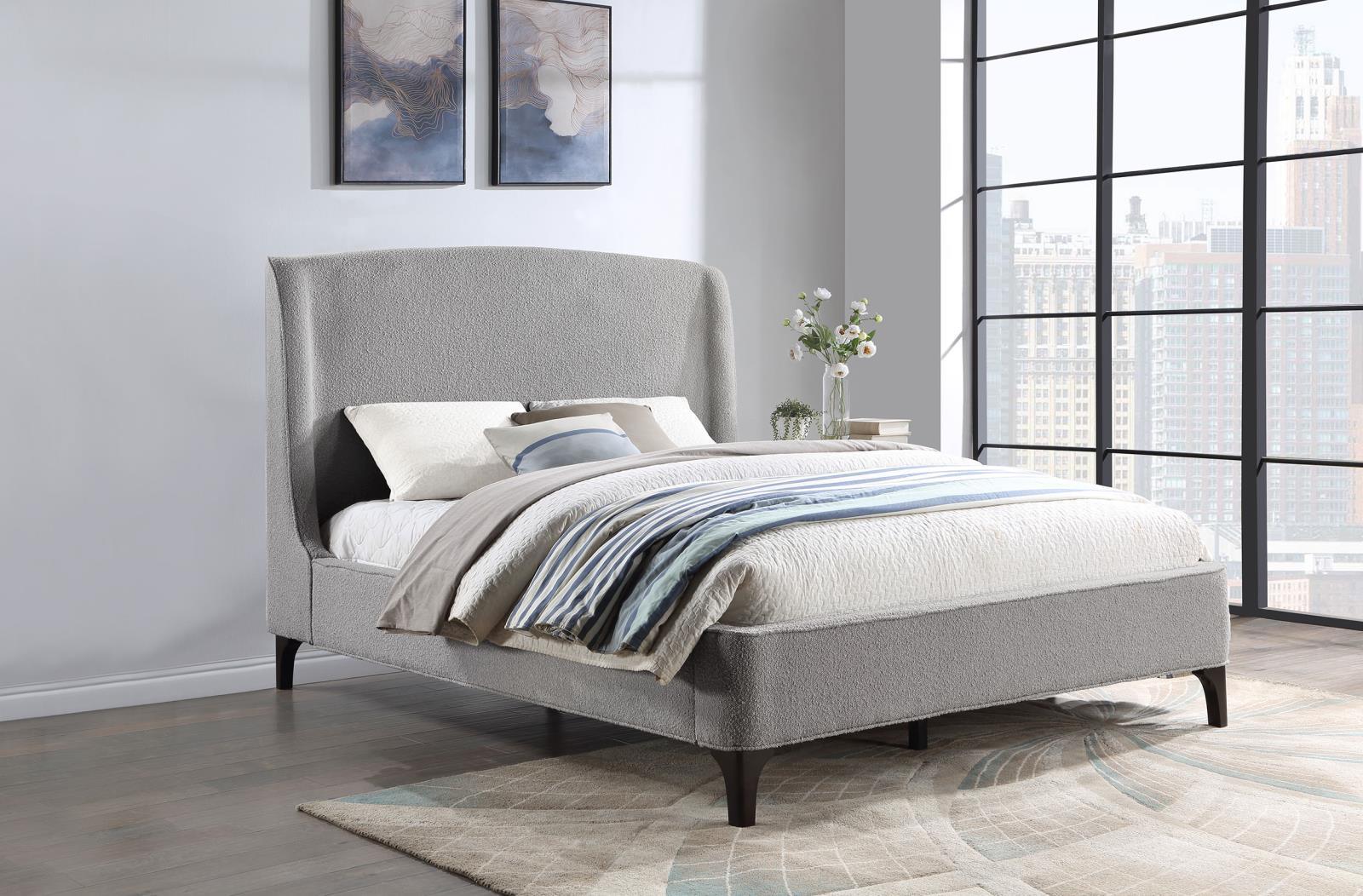 Mosby Eastern King Upholstered Platform Bed with curved headboard in light grey, front angle