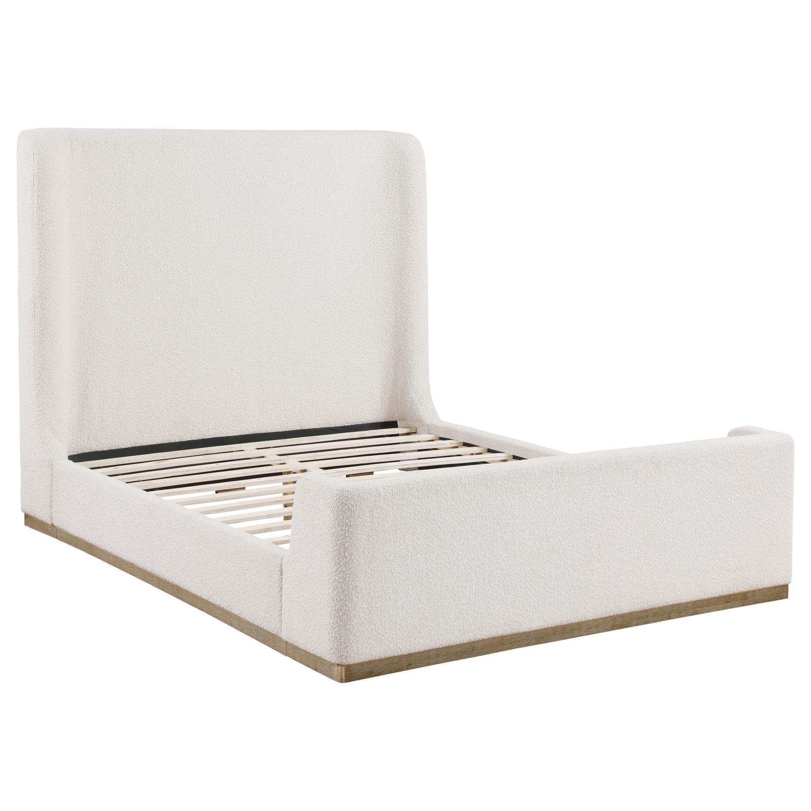 Nala Eastern King bed showing platform sleigh footboard in cream upholstery