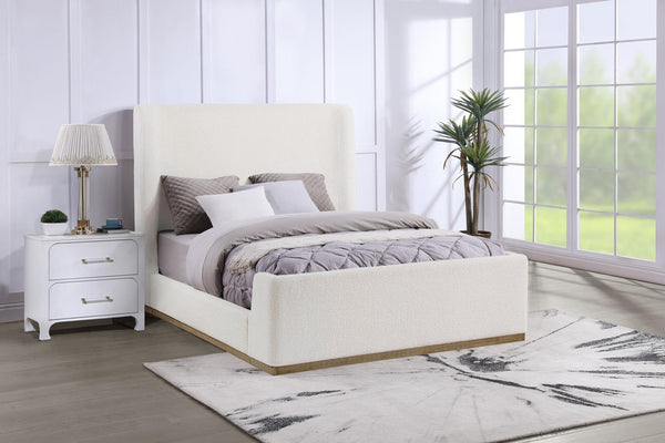Nala Upholstered Eastern King Wingback Platform Sleigh Bed cream angled front view